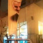 پاره کردن عکس شهید سلیمانی
